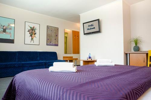 Postel nebo postele na pokoji v ubytování Hotel Ambiente Berlin City