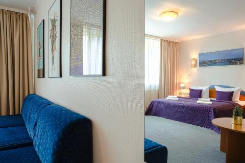 Postel nebo postele na pokoji v ubytování Hotel Ambiente Berlin City