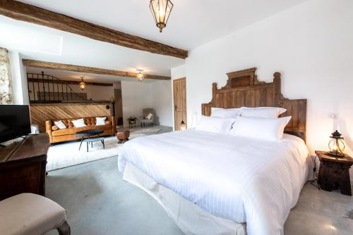 Cama o camas de una habitación en L' Ecrin des vignes