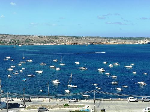 a large body of water with boats in it at No8 @ Seabreeze Court in Mellieħa