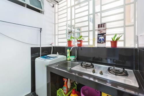 Η κουζίνα ή μικρή κουζίνα στο Homestay@AEON Desa Tebrau