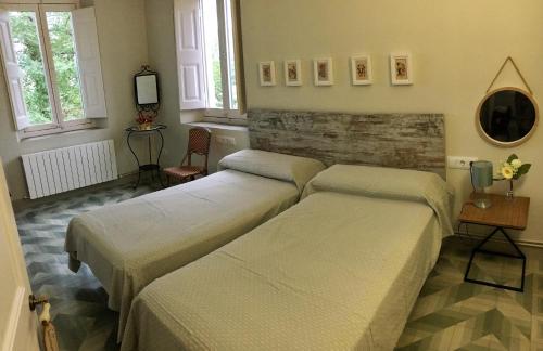 Ένα ή περισσότερα κρεβάτια σε δωμάτιο στο TORRE de CODINAC