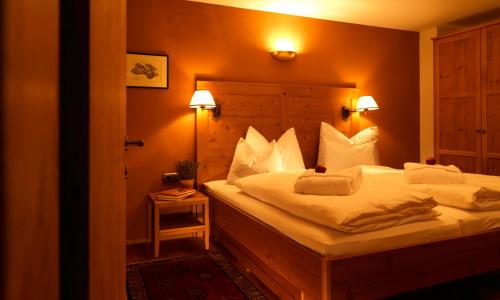 Posteľ alebo postele v izbe v ubytovaní Chalet Hus Hörili