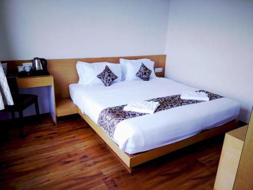 Cama o camas de una habitación en Hotel Ninamma