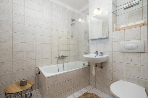 Kúpeľňa v ubytovaní Noctis Apartment Powiśle