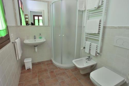 a bathroom with a shower and a toilet and a sink at Ca' De Angiolina in Sanremo