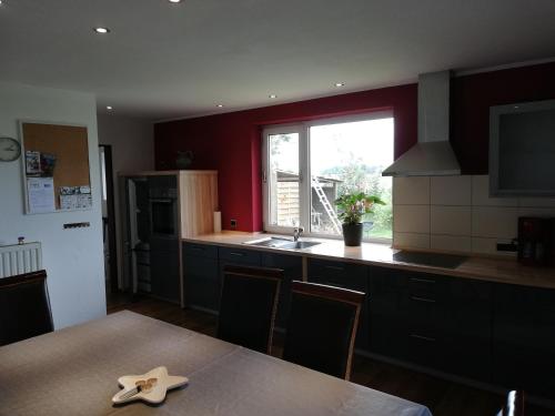 a kitchen with a starfish on top of a table at Süderdeich in Koldenbüttel
