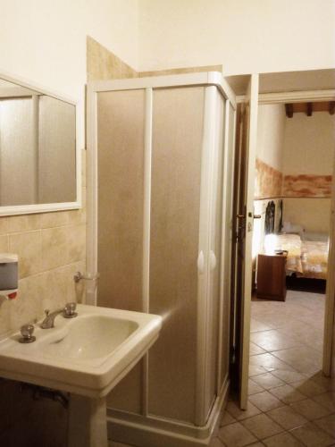 a bathroom with a sink and a shower at Villa Laura Apartment in Giardini Naxos
