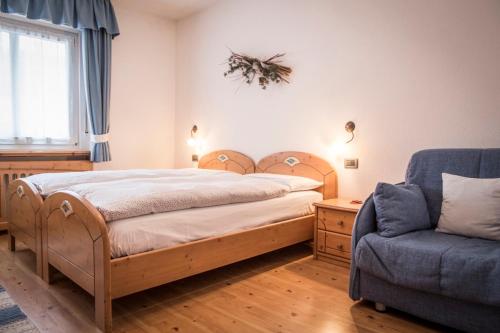 Postel nebo postele na pokoji v ubytování Appartamento Rose Di Bosco