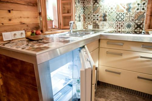 a kitchen with a sink and a counter top at ABC apartments in Kamnik