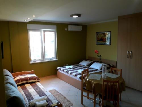 Katil atau katil-katil dalam bilik di Apartments Popovic