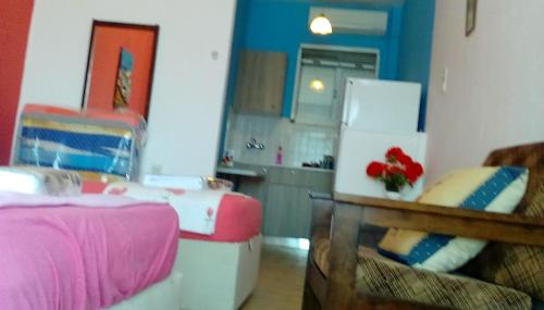 En eller flere senge i et værelse på Aggelsol