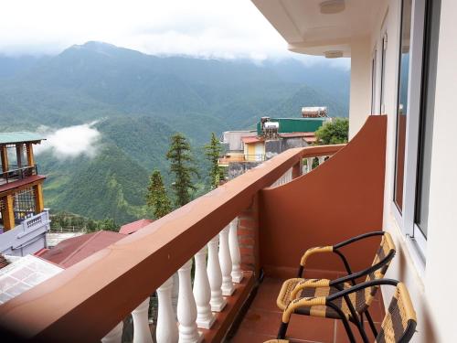a balcony with a view of a mountain at Cat Cat View Hotel in Sa Pa