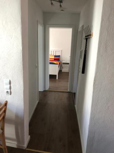 a room with a door leading to a hallway at Apartments Stadtmauer in Northeim