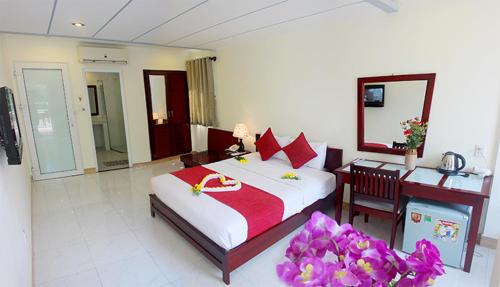 Cama o camas de una habitación en Ha Anh Hotel - Mui Ne
