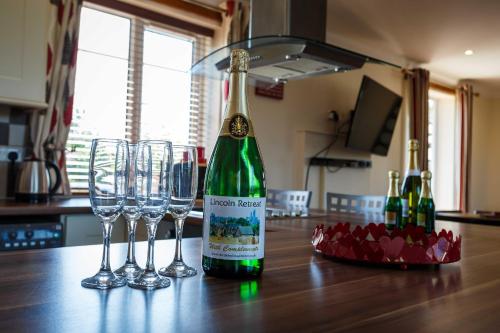 Drinks på Lincoln Holiday Retreat Lodge with Private Hot Tub