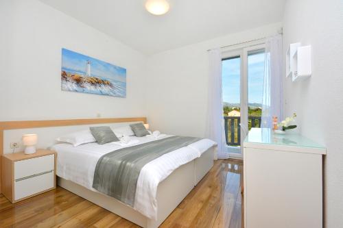 Postel nebo postele na pokoji v ubytování Villa Kami - 4 stars villa, Heated pool