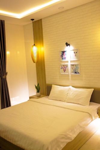 Ένα ή περισσότερα κρεβάτια σε δωμάτιο στο Max Hostel