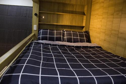 Ένα ή περισσότερα κρεβάτια σε δωμάτιο στο Max Hostel