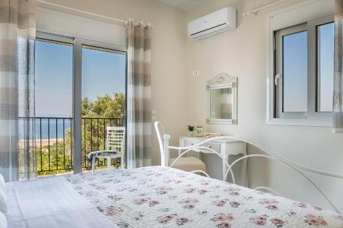 Postel nebo postele na pokoji v ubytování Villa SeaBreeze