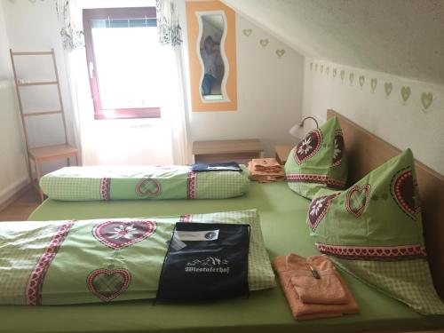 Postel nebo postele na pokoji v ubytování Wiestalerhof