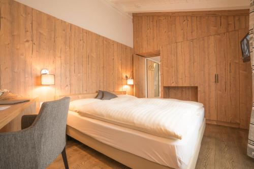 Postel nebo postele na pokoji v ubytování Hotel La Romantica