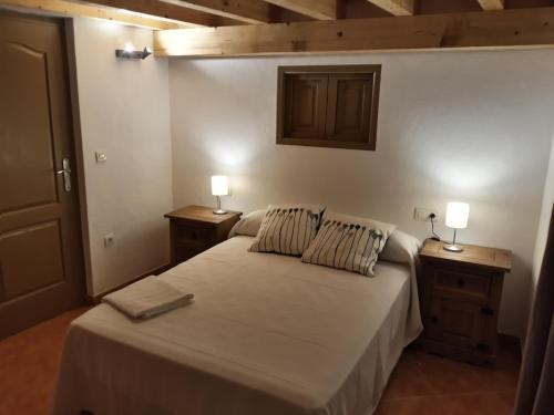 Katil atau katil-katil dalam bilik di Hostal El Rincon de la Vera