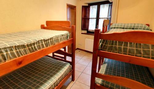 Postel nebo postele na pokoji v ubytování Can Grau Rupit