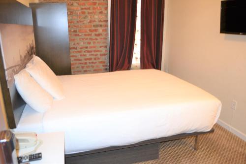 Ένα ή περισσότερα κρεβάτια σε δωμάτιο στο Inn on Folsom
