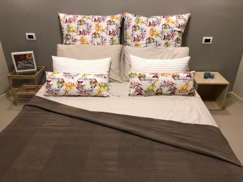 A bed or beds in a room at Giader's House - Free Parking