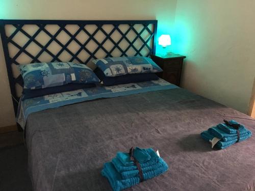 A bed or beds in a room at Al Baglio low cost