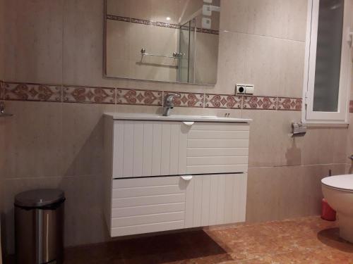 a bathroom with a sink and a toilet at Apartamento Logroño in Logroño