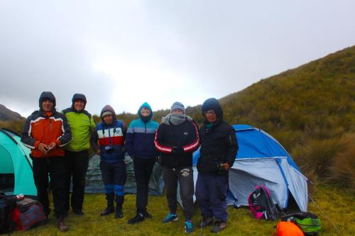 a group of people standing in front of a tent at Casa de Luis in Otavalo