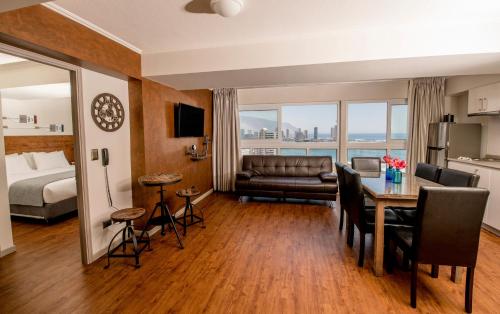 Gran Cavancha Hotel & Apartmentにあるベッド