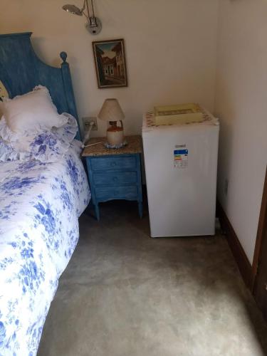 Katil atau katil-katil dalam bilik di Suites em meio a Mata Atlântica