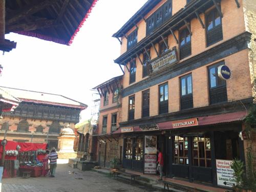 a street in an old town with buildings at Shiva Guest House in Bhaktapur