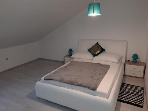 Katil atau katil-katil dalam bilik di Apartman Mohenski