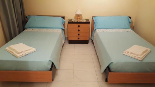 Postel nebo postele na pokoji v ubytování Ca Tibaria