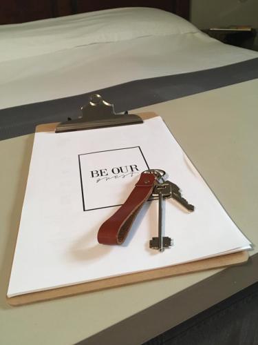 a toy gun on a white paper on a table at B&B Locanda Toscanini in Cetona