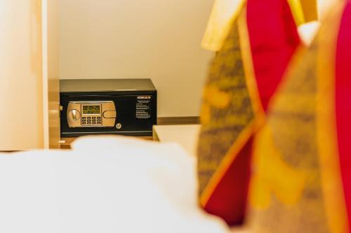 a toaster oven sitting on a counter in a room at AVA Hotel & Apartment in Danang