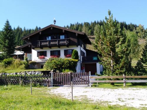 a house with a fence in front of it at Almidylle Kathrin in Strobl