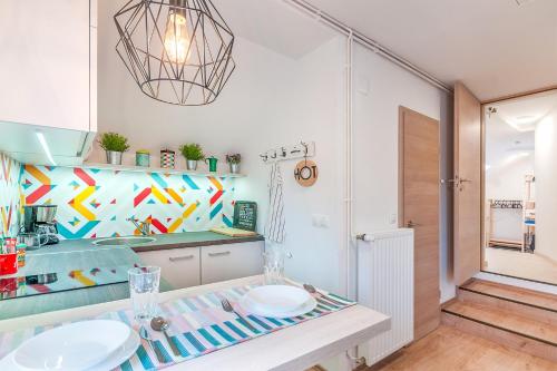 Kuchyň nebo kuchyňský kout v ubytování TOP Apartman