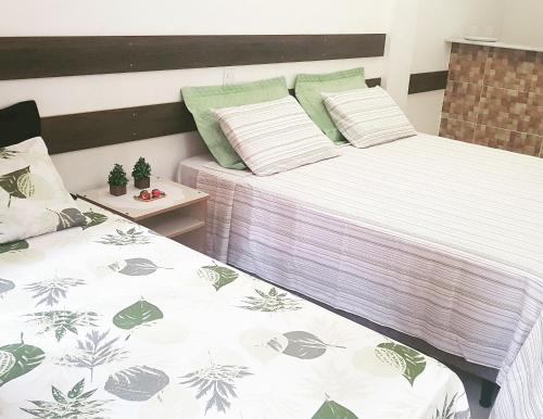 Кровать или кровати в номере Residencial Santa Teresa