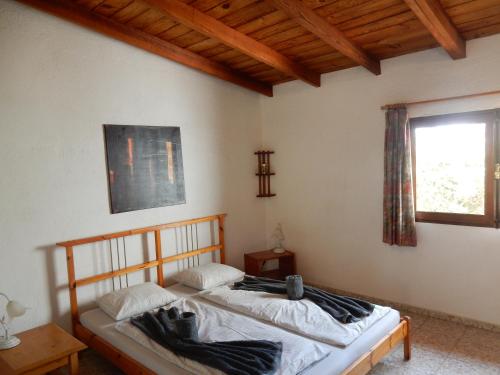 Postel nebo postele na pokoji v ubytování Finca Florida