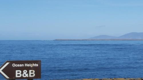 a sign that reads ocean heights bbb on the beach at Ocean Heights B&B in Lissadell