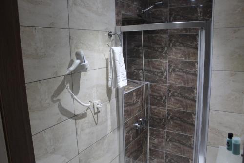 Koupelna v ubytování HOTEL MİKLAGORD