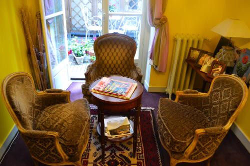Zona de estar de Hotel Windsor Home