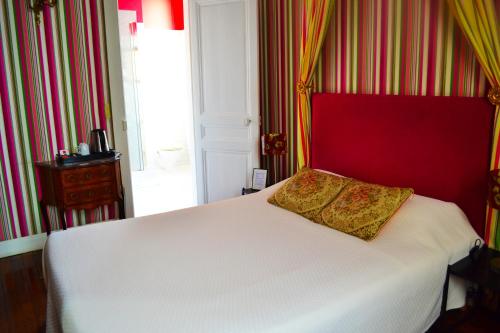 Cama o camas de una habitación en Hotel Windsor Home