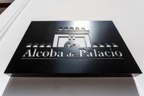 a black box with a alcoa de palapa sign at La Puerta de Palacio - Adults Only in Seville