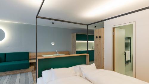 Katil atau katil-katil dalam bilik di Paramount Alma Suites Sexten